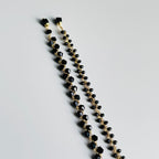 Apyrankė su juodais kristalais