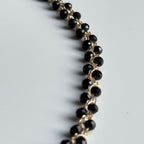 juodu stiklo kristalo karoliuku papuošalas