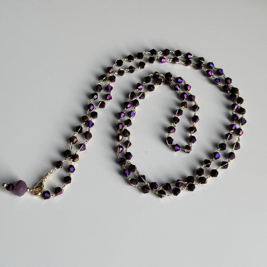 purpurinis kaklo papuošalas